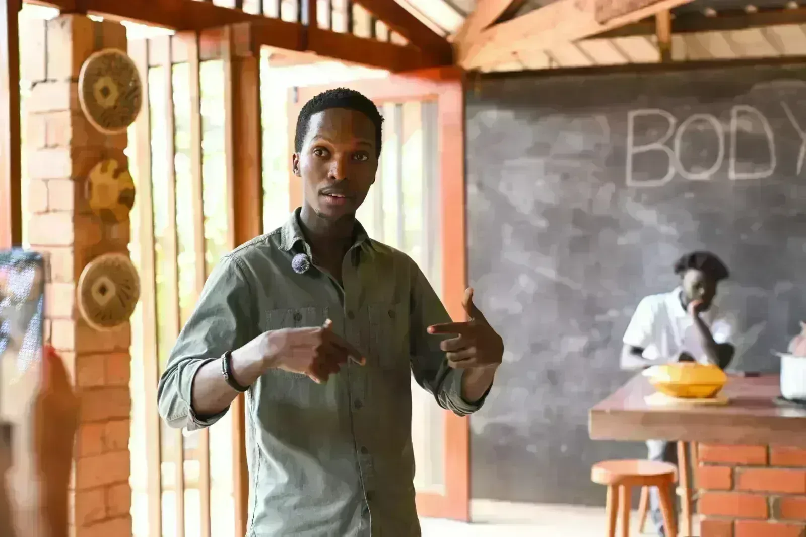 Enock Jowel presenting to the team at body and soil