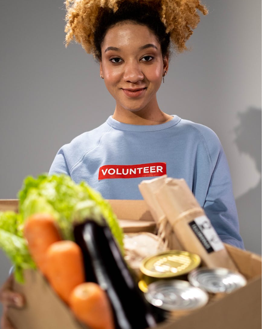 Volunteer holding food
